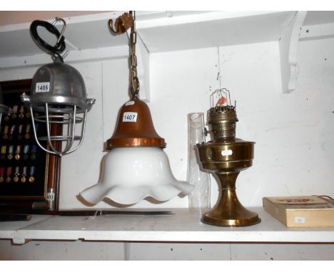 An Edwardian hanging lamp with copper fittings and an Aladdin parafin lamp