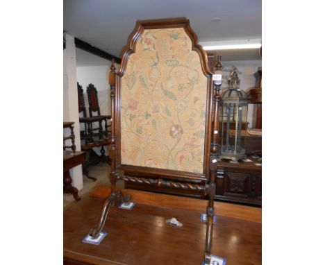A Victorian mahogany framed tapestry fire screen