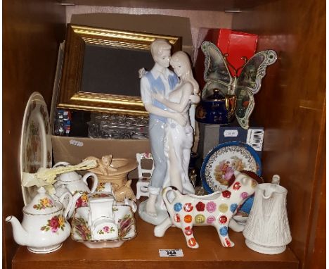 An Avoca Cow Creamer (boxed), a large Lladro style figure of a couple, a decanter & stopper, a Heron Cross Teddy Bears plate,