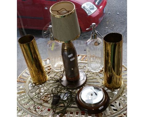 A Quantity of Items to Include a Very Unusual Trench Art Lamp, along with two brass shells, a barometer, two Irish soda sypho