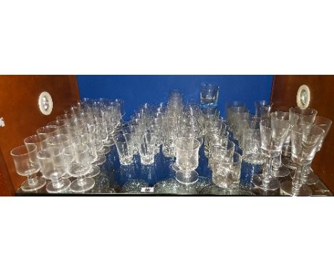 A Full Shelf of Various Glassware.