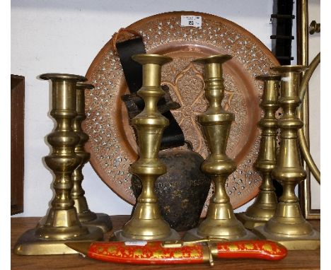 Three Pairs of 19th Century Brass Candlesticks, along with an Alpine cow bell, an embossed copper plaque & a decorative knife