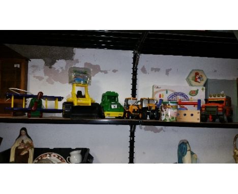 A Good Collection of Toys to include a John Deere tractor, JCB digger, JCB Fastrac, large bomber aeroplane, an aeroplane ceil