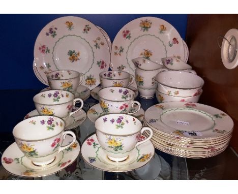 A Royal Doulton Bone China Tea Set for Six with six cups, saucers & side plates, two milk jugs, two sugar bowls and two cake 