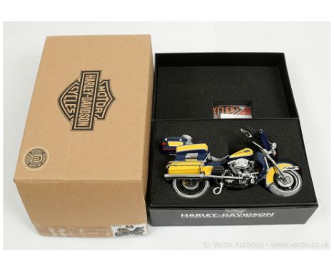 Die-cast Promotions (ERTL) 1/12th scale Motorcycle 10602 Harley Davidson FLHTCU Ultra Classic Electroglide "Michigan Wolverin