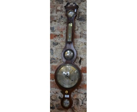 A 19th century mahogany wheel barometer with silvered dials and scale, by L. Bellatini, Lincoln