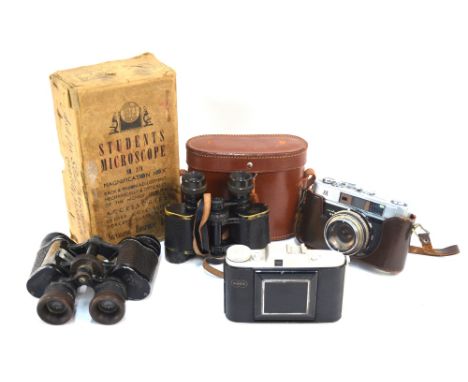 Two vintage cameras including Minolta AS, two pairs of binoculars and a student's microscope (box)
