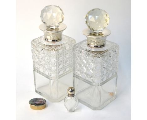 A pair of square-cut glass decanters and stoppers with silver collars, Preece & Williscombe, London 1935, to/w a Victorian cu