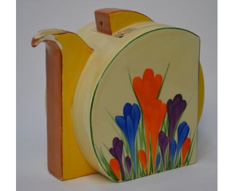 A Clarice Cliff Bizarre 'Stamford' teapot and cover decorated in the crocus pattern   Condition Report  Spout chipped.  Cover
