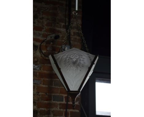 A pair of Art Deco ceiling light shades of pyramidic form with frosted and cut glass panels, 38 cm high, to/w a brass wall li