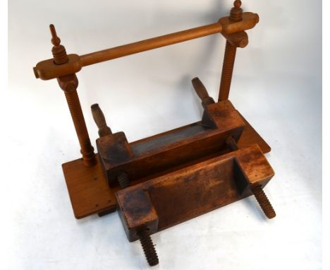 A 19th century wood-block book-binder's press, to/w a stretcher frame and various other bookbinder's tools and materials, som