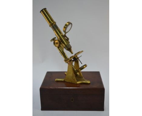 A brass microscope with hinged magnifier, in mahogany box, Adie & Son, Edinburgh