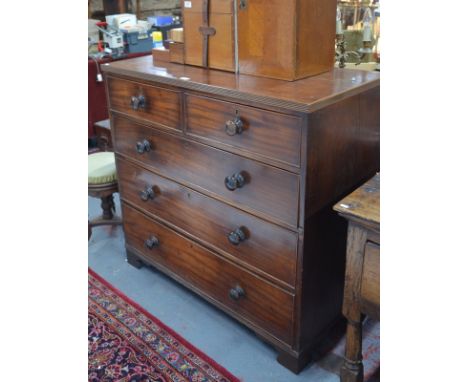 A George III mahogany chest of two short drawers with turned pulls, on bracket feet, 108 cm 
