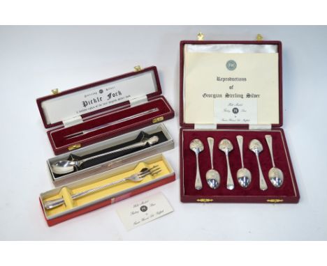 A cased set of Francis Howard silver replica teaspoons with decorated bowl-backs, to/w a cased 'First English Fork' and a box
