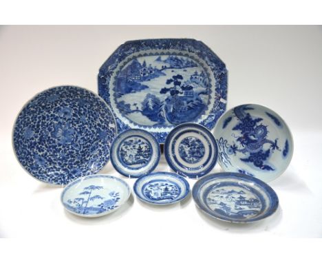 A large Chinese Export blue and white tureen stand or dish, 45 cm diameter, Qianlong/Jiaqing; together with seven other blue 