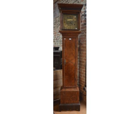 An early 18th century burr walnut and crossbanded longcase clock, the modified eight-day movement with 12 cm square dial by S