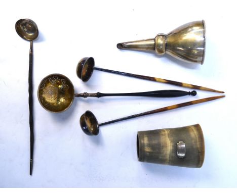 A German strainer-ladle on ebonised handle, .800 grade, to/w three electroplated toddy ladles, a horn beaker with white metal