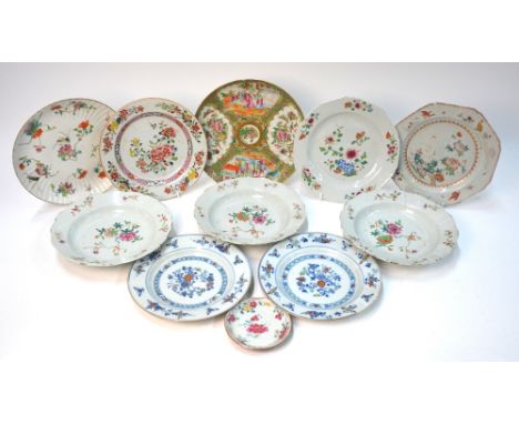 Eleven items of Chinese Export Porcelain, including a Canton famille rose dish decorated with Manchu/Chinese figures; and a s