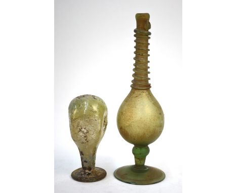 A small Roman glass vessel with dimpled body, 11 cm high to/w an antique iridescent ovoid flask with applied spiral tube deco