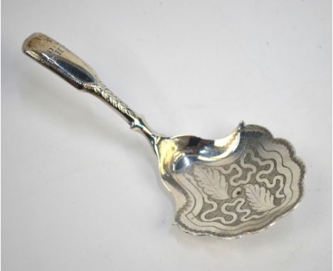 A George III silver fiddle pattern caddy spoon with scalloped bowl and nail-punch decoration, Joseph Taylor, Birmingham 1816