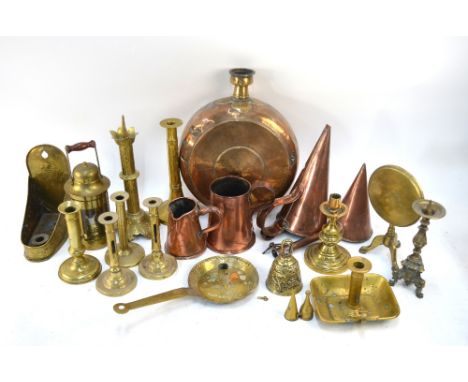 A quantity of antique and later copper and brassware including; candlesticks, conical hot water pans, lamps, moon-flask, etc.