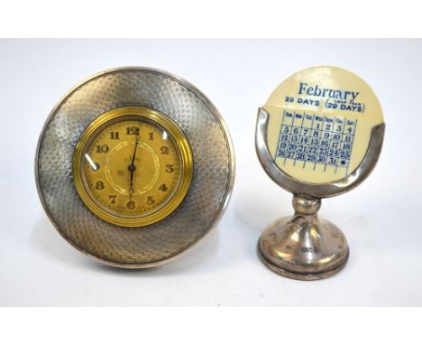 An Art Deco silver-framed circular desk clock with engine-turned decoration, 8-day Swiss movement, Birmingham 1925, to/w a sm