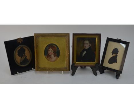 A Regency portrait miniature of a young gentleman in black coat, to/w a sketch miniature of a red-haired lady and two silhoue