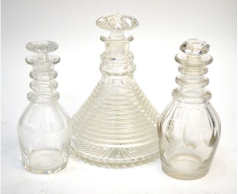 An early 19th century ship's spirit decanter, the body with horizontal prismatic cutting, two facet cut neck rings, star-cut 