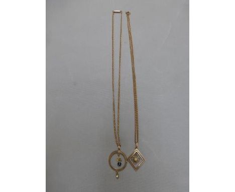 A 9ct gold pendant necklace, the pendant set with an opal and another pendant necklace set with a sapphire and peridot. 