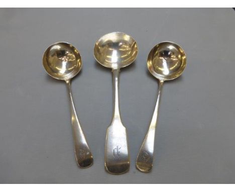 Two silver sauce ladles, maker's mark rubbed, London 1799 and one other silver ladle, maker SH, DC, London 1839.