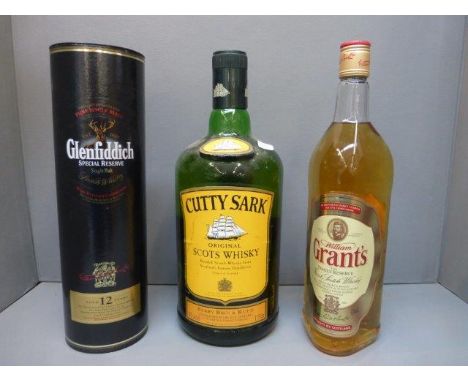 A large bottle of Cutty Sark Original Scots Whisky, a cased bottle of Glenfiddich Special Reserve and a bottle of Grants Scot