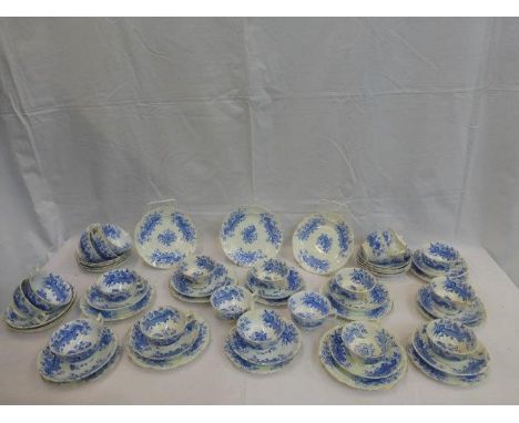 A 19th Century blue and white coffee set decorated with flying dragons comprising 21 cups, 22 saucers and 14 side plates. 