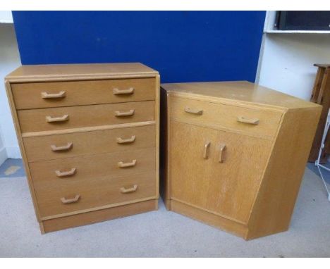 An Arts and Crafts style light oak chest of five drawers and a floor standing corner cabinet with single drawer above a cupbo