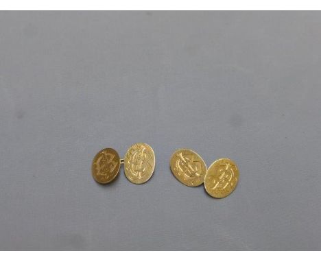 A pair of 18ct gold cufflinks.