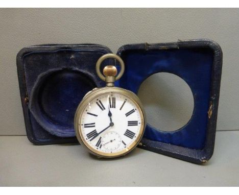 A large pocket travel clock with travelling case.