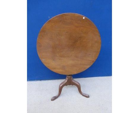 A 19th Century mahogany circular tilt-top tripod table. 