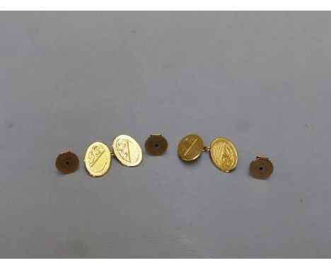 A pair of 9ct gold cufflinks and three 9ct gold dress studs. 