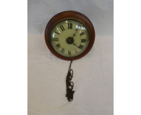 A Victorian mahogany 'post office alarm' circular wall clock, the painted dial set with Roman numerals.
