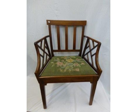 A 19th Century mahogany carver armchair with 'Chinese Chippendale' style fretwork decoration. 
