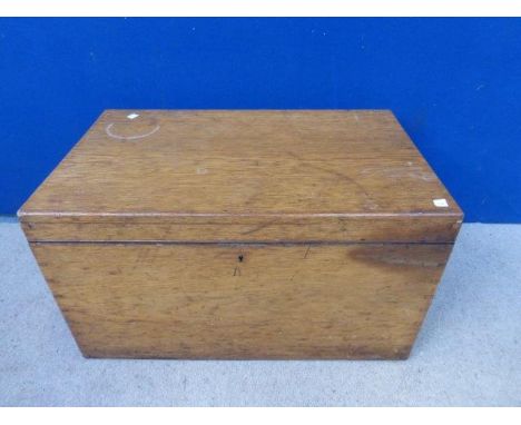 A light oak twin handled lidded box. 
