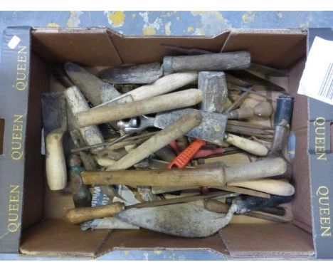 A box of assorted builders' tools. 