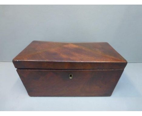 An early Victorian mahogany tea caddy. 