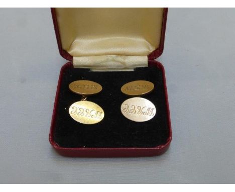 A pair of 9ct gold cufflinks. 