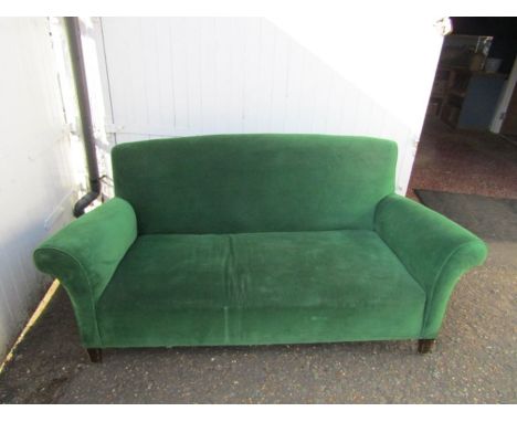 Green velvet sofa marked 1953 originally used in the War Office  200cm wide x 86cm deep x 84cm high