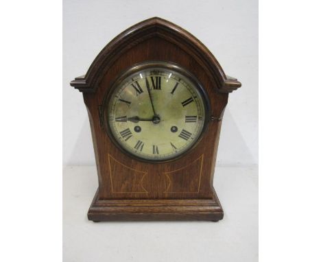 Edwardian mantle clock with pendulum and key.