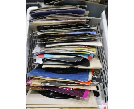 Mixed singles including 1980s picture sleeves. UK P&amp;P Group 2 (£20+VAT for the first lot and £4+VAT for subsequent lots) 