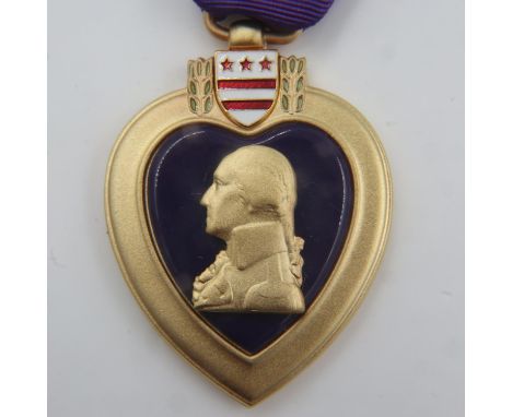 WWII US Purple Heart Medal in presentation box. UK P&amp;P Group 2 (£20+VAT for the first lot and £4+VAT for subsequent lots)