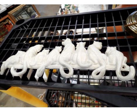 Cast iron cat tail coat hanger, L: 36 cm. UK P&amp;P Group 2 (£20+VAT for the first lot and £4+VAT for subsequent lots)
