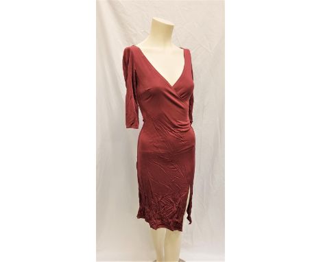 xXx (2002) - FOUR COSTUME ITEMS comprising a ROSE WRAP STYLE DRESS BY KOOKAI, made in France, 100% viscose; A WHITE SNAP SKIR