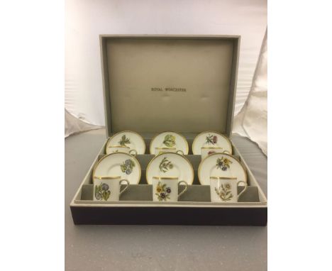 A boxed Royal Worcester set of six coffee cans and saucers